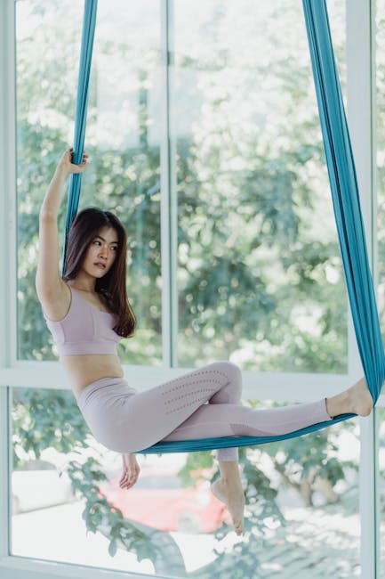 Woman practicing pranayama with calm expression in a bright room